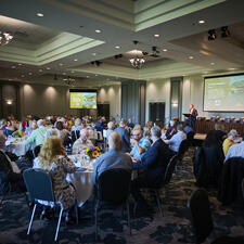 All attendees for the retirement dinner sitting at their tables